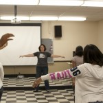 Emily Gill, UM theatre professor, leads Blueprints students in an improvization activity