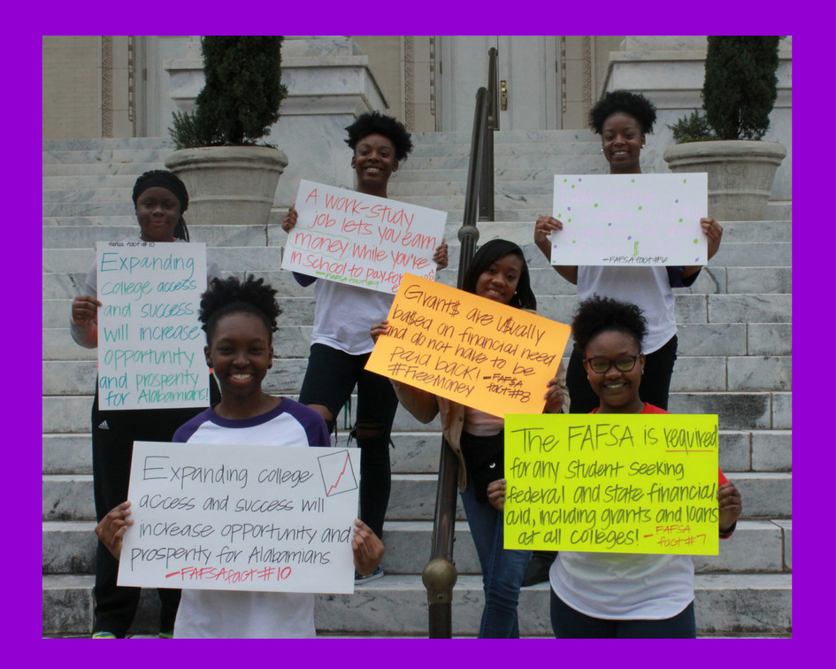 Ambassadors with signs
